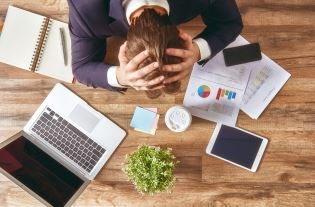 Overview of Man at His Desk 